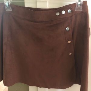 Brown suede material skirt with silver buttons